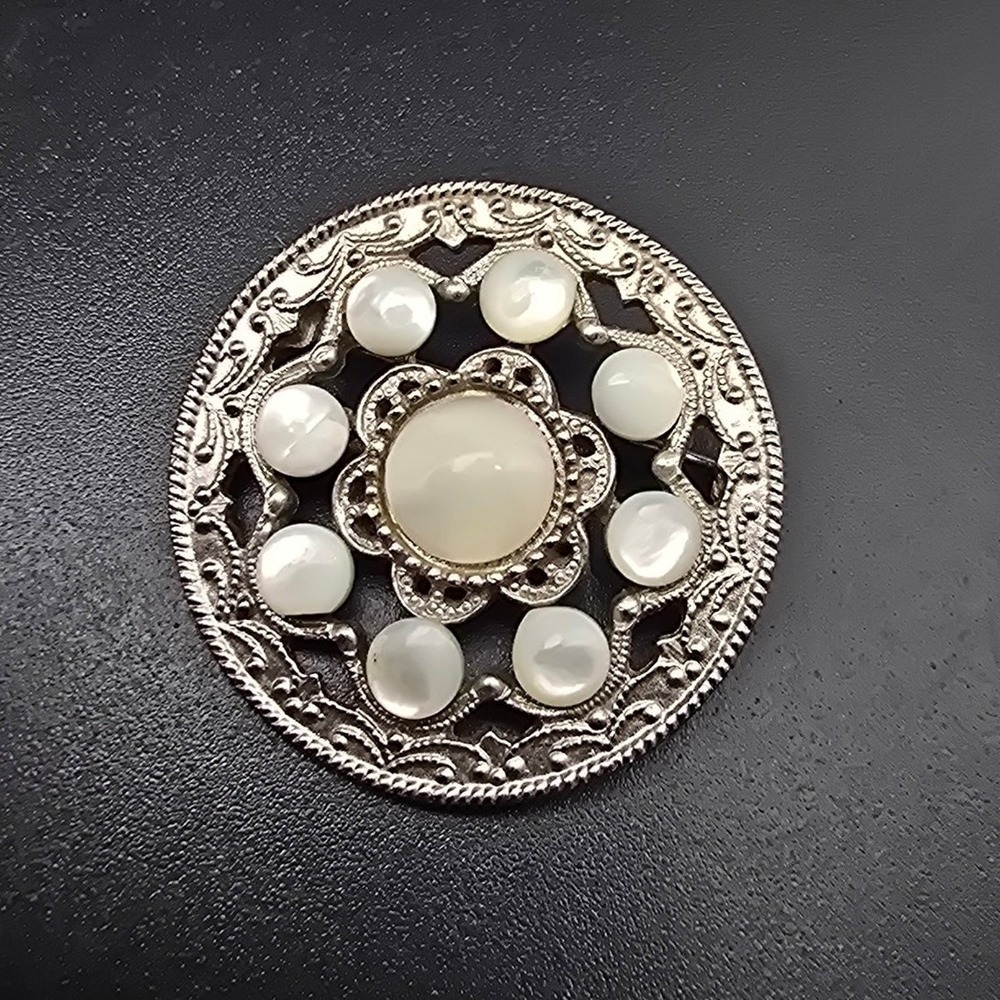 1928 Brand Moon Glow Brooch Round Silver Tone Ornate Costume Jewelry